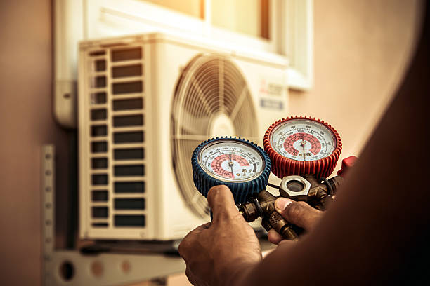 Professional Heat Pump Repair technician working in Stockton, AL
